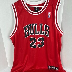 Adidas Bulls Red Jersey with Number 23 Michael Jordan.